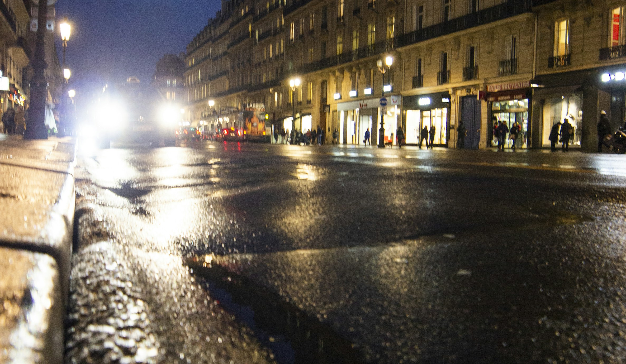 Paris street at night after rain